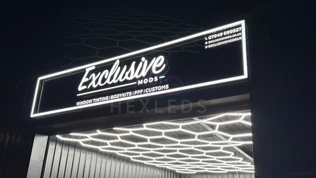Car styling shop using hexagon lights with outdoor lit up sign