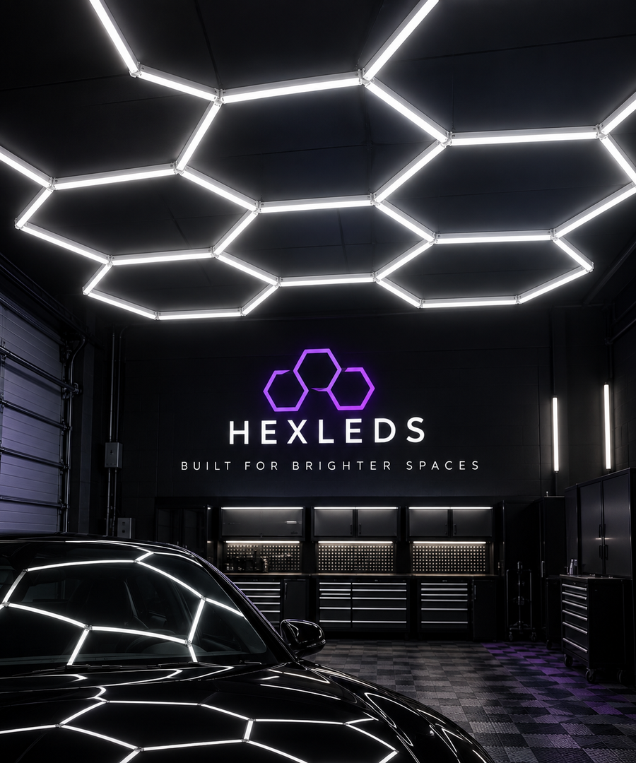 Black workshop with black accents and hexagon lighting. 